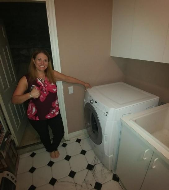 Elevate Repair technician completing a dryer repair in Denver
